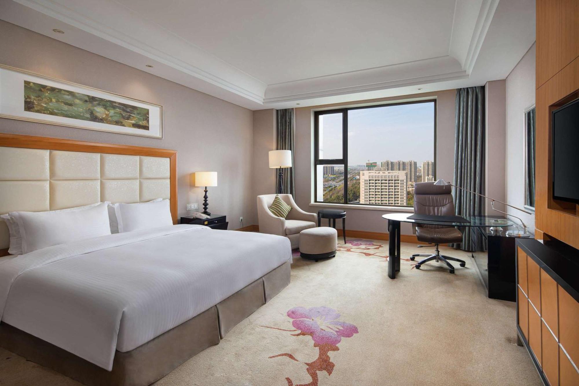 Wyndham Xinyang Downtown Xinyang (Henan) Exterior foto